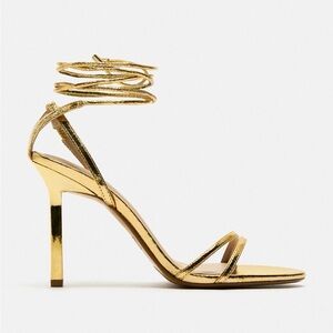 Brand new Gold lace up heels